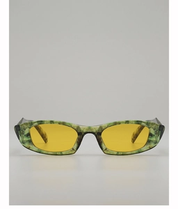 Detail of vintage cat eye sunglasses with green marble frame and yellow lenses