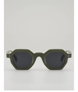 Detailed front view of olive green hexagonal sunglasses with silver rivet accents