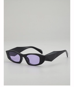 Detail of black cat-eye sunglasses with purple lenses and geometric temple design