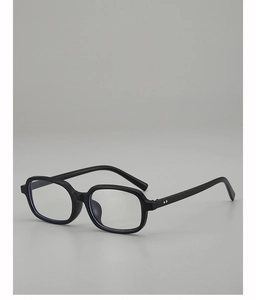 Close-up of black square sunglasses frames featuring double silver rivet details