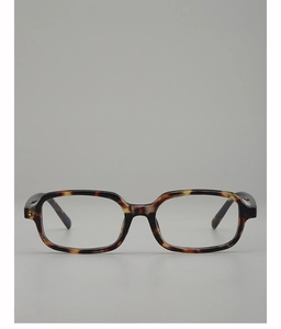 Detailed close-up of retro tortoise shell rectangular sunglasses with acetate texture