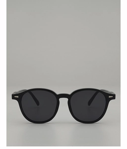 Front view of oval black sunglasses with minimalist silver metal rivets on the frame
