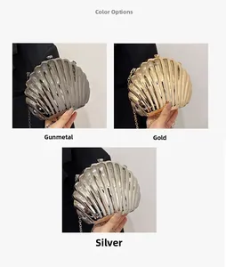 Dettagli delle borse da sera a conchiglia metallica nei colori canna di fucile, oro e argento