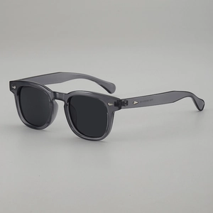 Retro round grey translucent sunglasses with silver arrow detail and black lenses