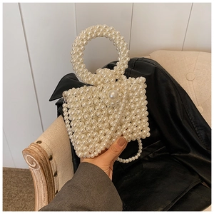 Handmade pearl bead handbag with circular top handle and elegant shoulder chain strap