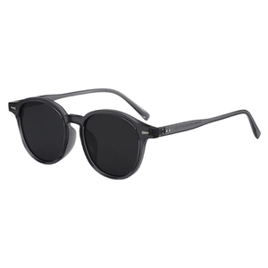 Vintage oval sunglasses with translucent grey resin frame and protective black lenses