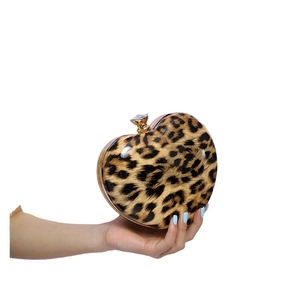 Fashionable heart-shaped leopard print clutch bag with a crystal-encrusted gold metal clasp