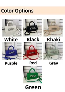 Detail shot showing the variety of colors and rhinestone bow decor for the mini box bag