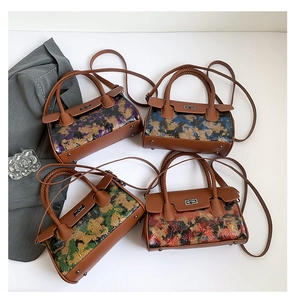 Collection of vintage oil painting style Boston bags in four colorways with metal locks