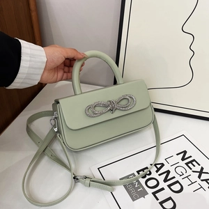 Mint green shoulder bag with rhinestone bow and detachable silver chain strap