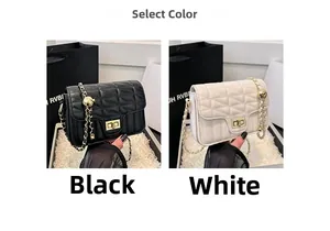 Quilted chain shoulder bag in black and white leather with gold-tone hardware detail