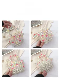 Detail view of mini woven pearl handbag with colorful square beads and pearl top handle