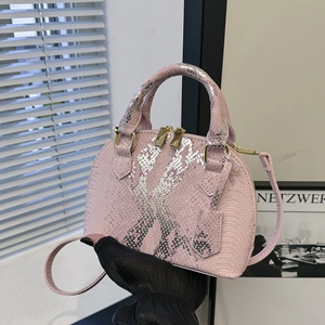 Pink snake pattern shell bag with silver sequins and golden double zipper accents