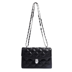 Classic black quilted crossbody bag with silver hardware and interwoven chain strap