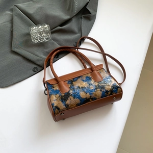 Retro brown leather handbag with blue tie-dye texture and woven top handle in Boston style