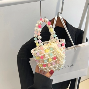 Handmade pearl beaded mini bucket bag with colorful cubes and satin bow detail