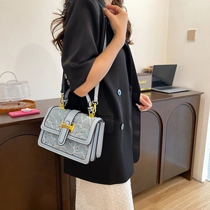 Sparkling light blue sequin handbag with gold H-buckle and elegant embroidery