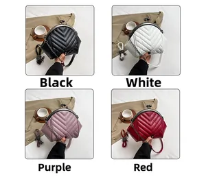 Quilted shell bags in black, white, purple, and red featuring retro metal clasps