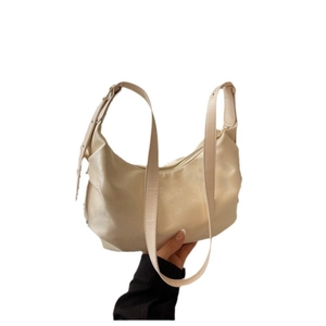 Minimalist cream white half-moon shoulder bag with adjustable strap for women