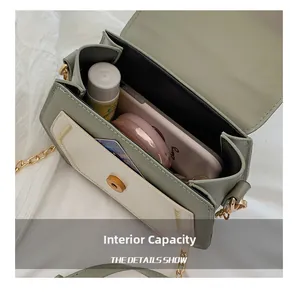 Internal capacity of contrast color chain bag showing phone and cosmetics space