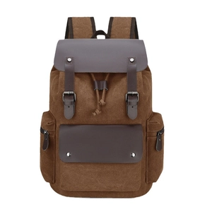 Vintage brown canvas backpack with leather flap and drawstring closure for daily travel