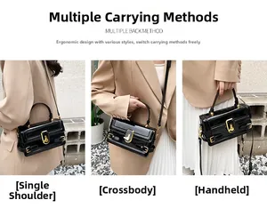 Détails d'un sac à main en cuir verni noir avec fermoir doré pour porter à l'épaule ou croisé