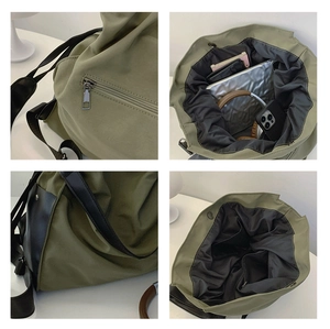 Detailed interior compartments of army green nylon bucket bag showing storage for devices