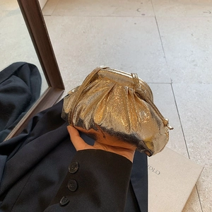 Chic metallic gold pleated cloud clutch bag with elegant ruched texture for evening parties