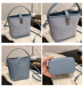 Dettagli della borsa a secchiello intrecciata con finiture in pelle blu e chiusura