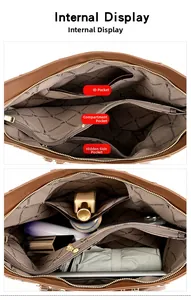 Interior view of brown tote bag showing spacious compartments and printed lining