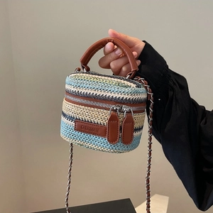 Mini striped woven underarm bag with leather handle and silver zipper for women