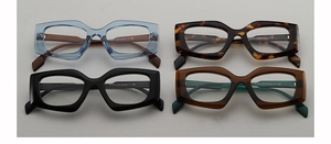 Detailed flat lay of geometric square eyeglass frames in four assorted colors