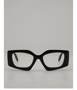 Front view of black thick-frame geometric glasses with clear lenses on gray background