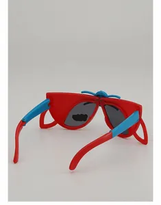 Detailed top view of foldable red and blue superhero style kids sunglasses with dark lenses