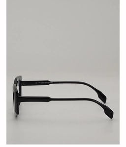 Detail shot of black thick frame glasses showing model number ZN3810 on the inner temple