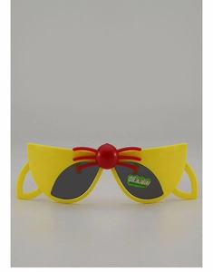 Detail of yellow cat-face kids sunglasses with red whiskers and dark UV lenses