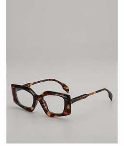 Detail of geometric leopard tortoiseshell eyeglass frames showing texture and structure