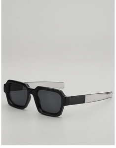 Detail of square black sunglasses with contrast transparent temples and dark grey lenses