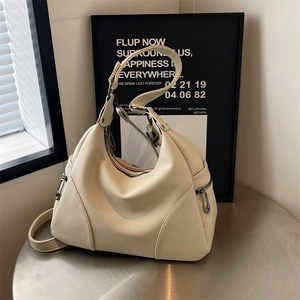 Chic off-white leather shoulder bag with lychee texture and multi-zipper compartments