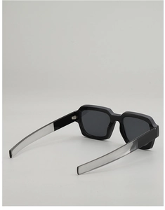 Detail view of square black sunglasses with dual-tone frame and thick temples