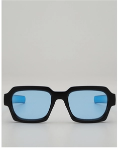 Front view of modern square sunglasses with thick black frames and light blue lenses