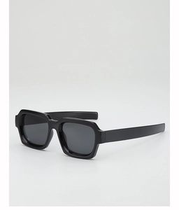 Close-up of black square sunglasses frame with dark lenses and durable texture