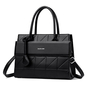 Elegant black leather tote bag with geometric stitching and silver logo detail
