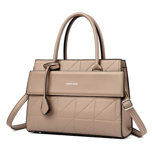 Retro khaki tote bag with geometric triangle quilting and silver metallic hardware