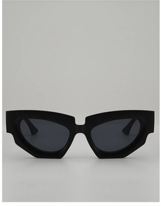 Front view of matte black irregular cat-eye sunglasses with bold geometric frame lines
