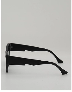 Side view of black irregular wide-frame sunglasses with unique geometric temples
