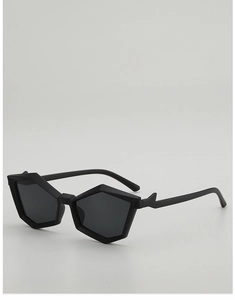 Detail of matte black geometric sunglasses with unique futuristic pentagon frame design