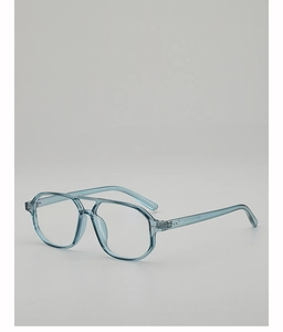 Detail of transparent light blue aviator frames with double bridge and metal rivets