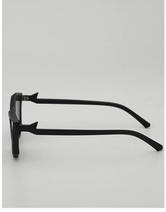 Side view of matte black geometric sunglasses with futuristic angular frame details