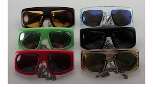 Detailed grid of oversized Y2K sunglasses in multiple colors with silver chain straps